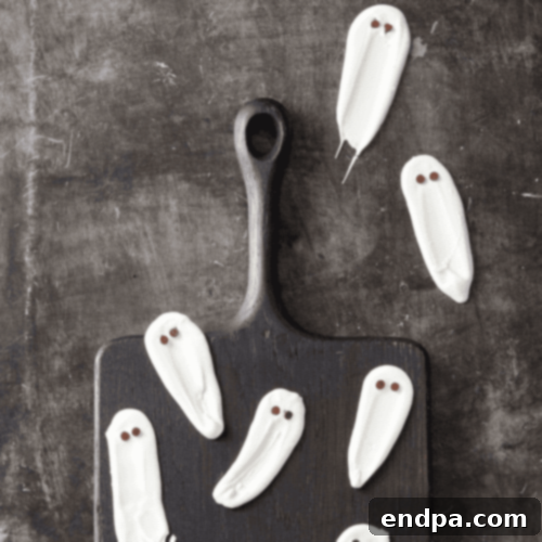 White chocolate ghosts arranged together.