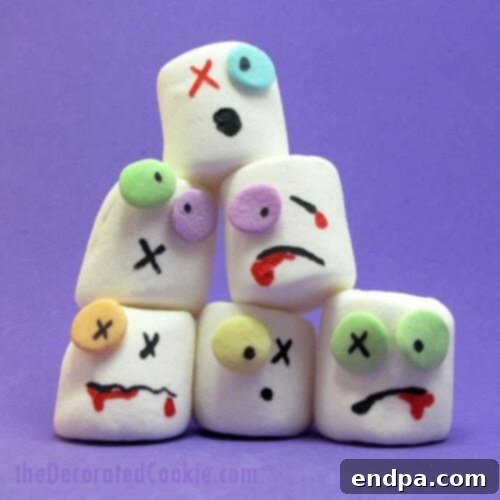Zombie marshmallows stacked together.