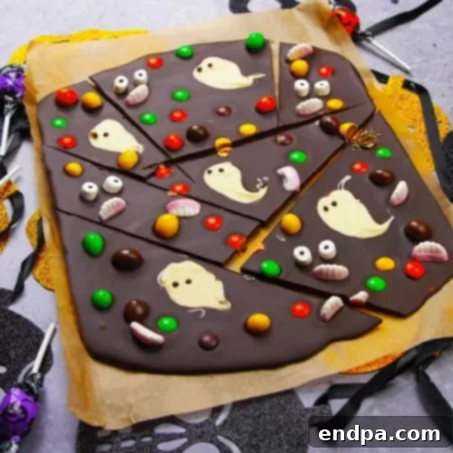 Chocolate bark decorated with Halloween candy.