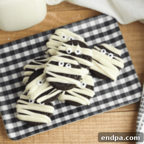 Oreo cookies decorated as mummies.