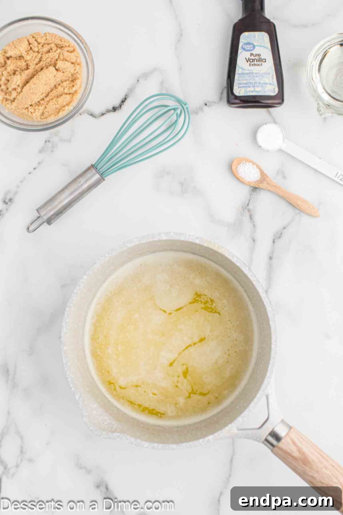 Saucepan of melted butter.