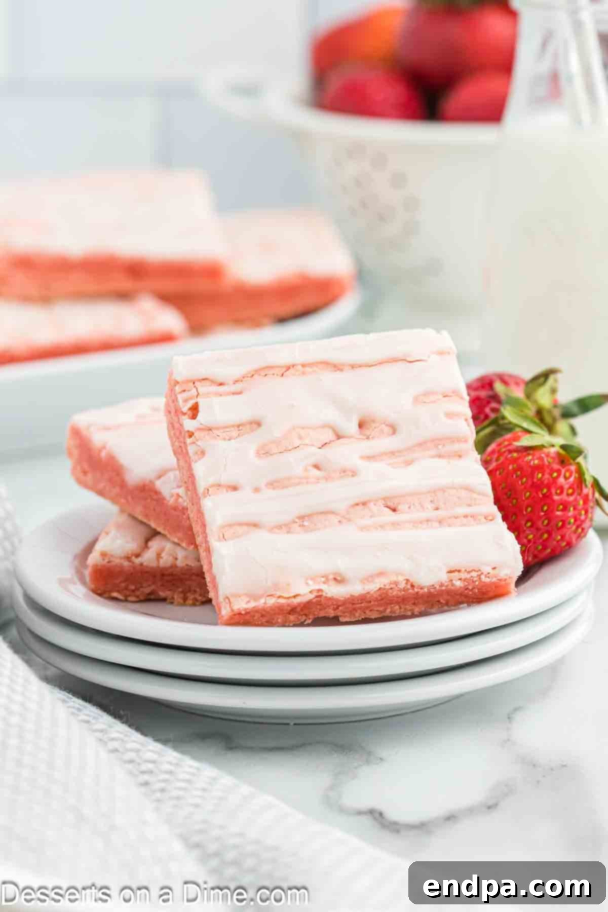 Freshly baked strawberry brownies, cut into neat squares and ready to serve.