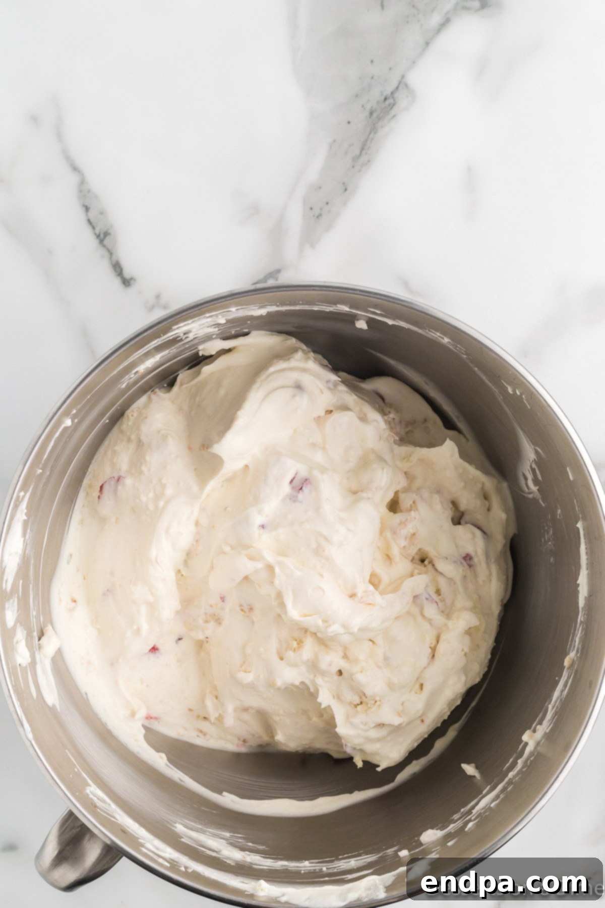 Ingredients folded into ice cream base.