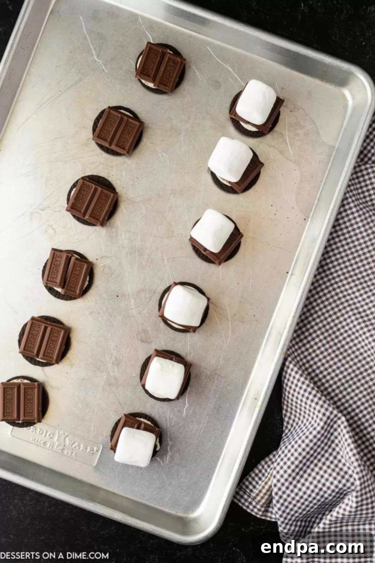 Oreo S'mores Dream 5 Small pieces of chocolate and large marshmallows added on top of each cream-filled Oreo half.