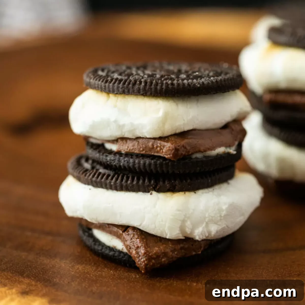 Oreo S'mores Dream 9 Oreo S'mores with melted chocolate and golden brown marshmallows.