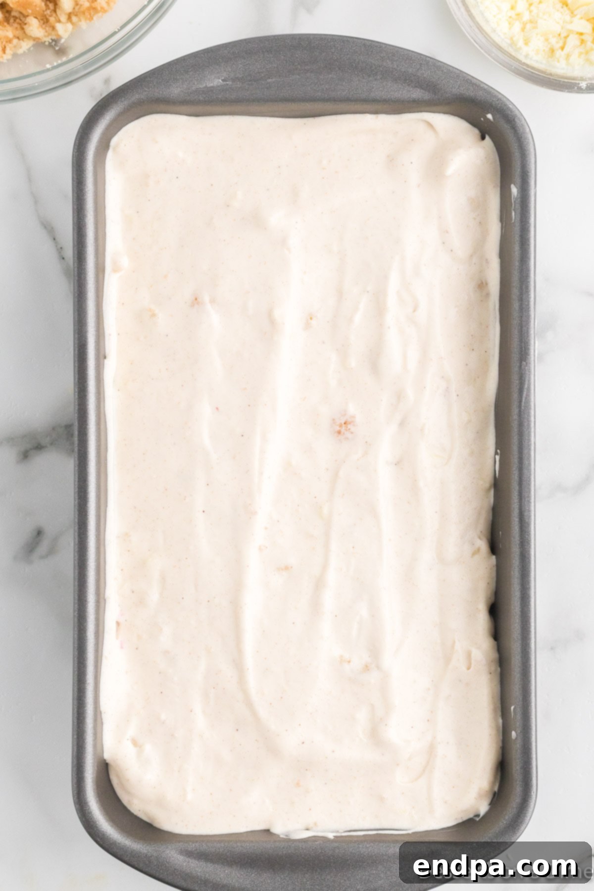 Merry Melts 11 Subsequent layers of ice cream mixture and sprinkles added to the loaf pan.