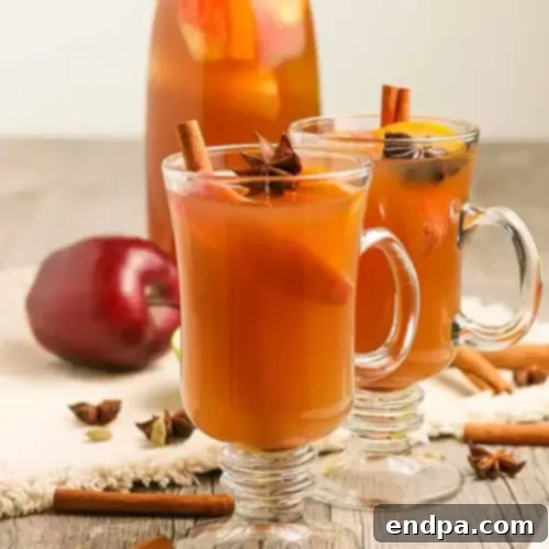 51 Effortless Apple Delights 11 Homemade Apple Cider with cinnamon sticks