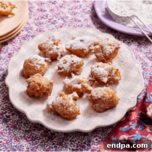 51 Effortless Apple Delights 51 Crispy Apple Fritters with powdered sugar
