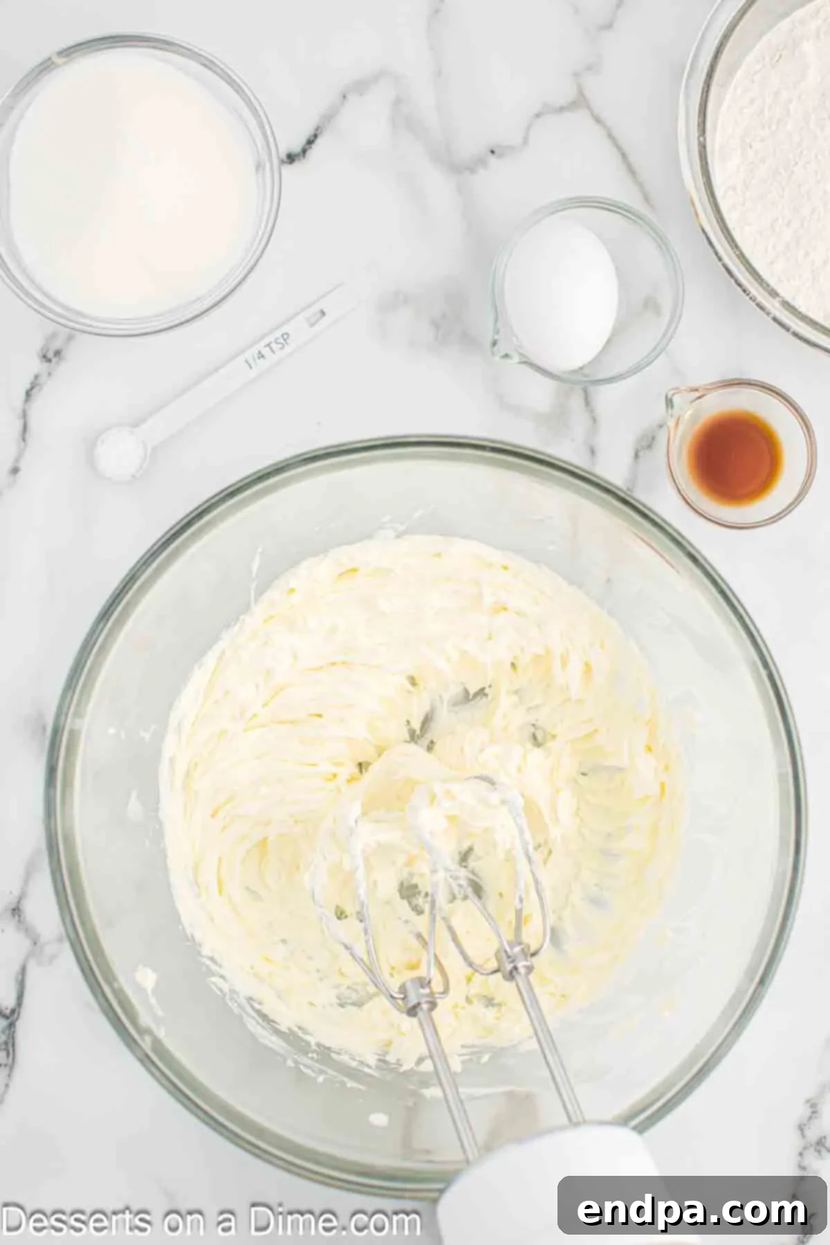 Rainbow Unicorn Drops 4 Mixing bowl with softened butter, shortening, and cream cheese combined until light and fluffy.