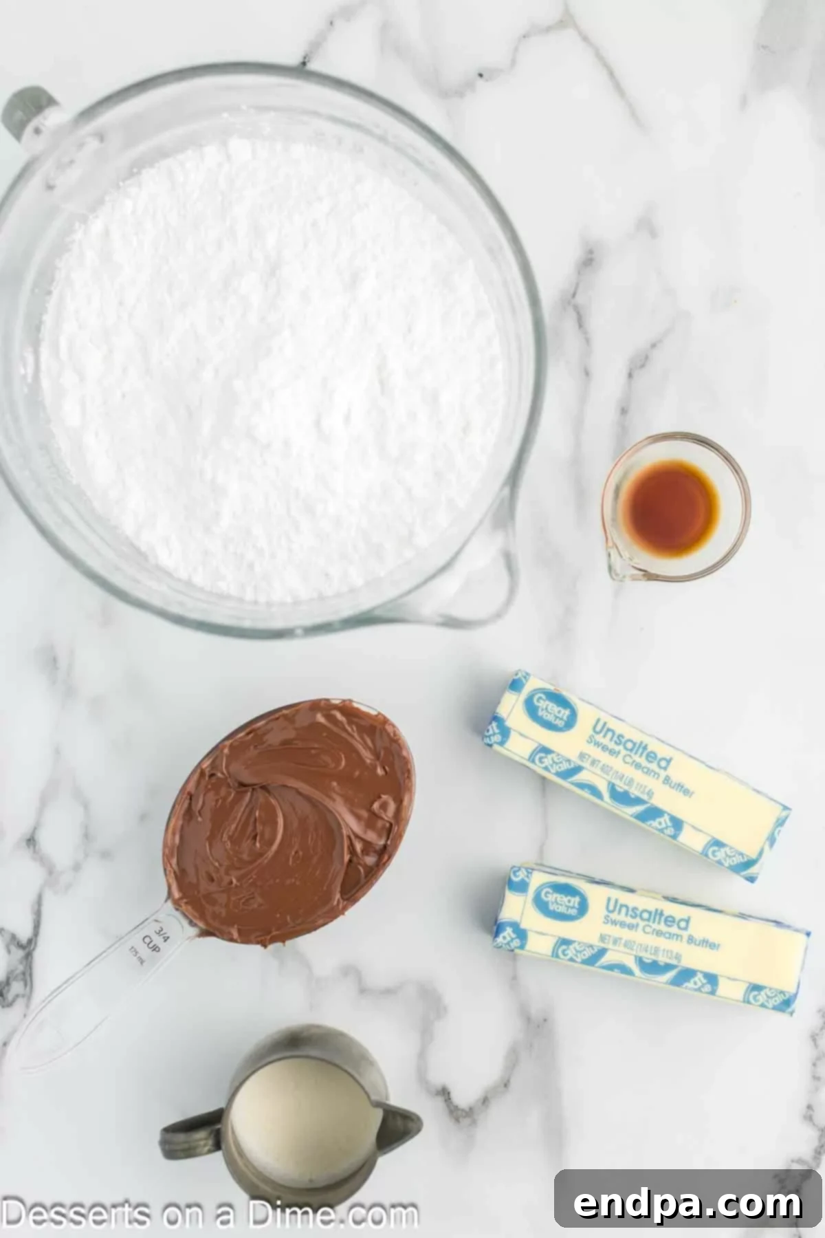 Whipped Nutella Delight 3 Ingredients for Nutella frosting: butter, powdered sugar, heavy cream, vanilla extract, and Nutella.