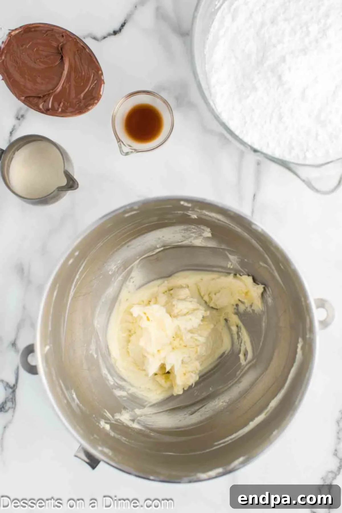 Whipped Nutella Delight 4 Softened butter in a large mixing bowl, ready to be creamed.