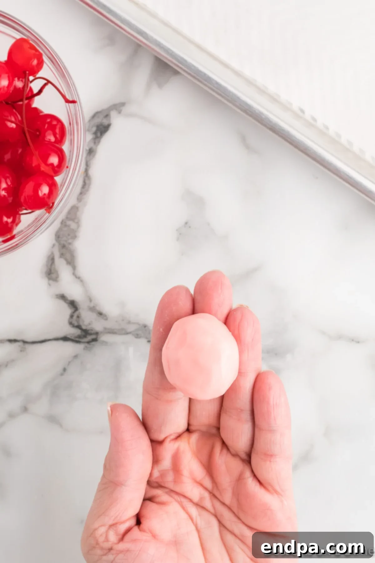 Dough wrapped into ball. 