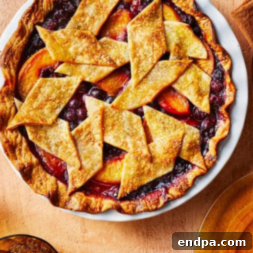 Peachy Keen: 51 Simple Dessert Ideas 10 Peach-Blueberry Pie with geometric crust pieces and turbinado sugar