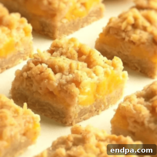 Peachy Keen: 51 Simple Dessert Ideas 12 Peach Crumble Bars with crunchy crumbles and soft peaches