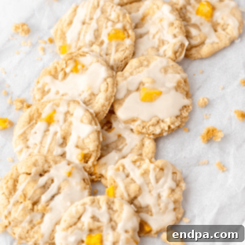 Peachy Keen: 51 Simple Dessert Ideas 20 Easy Peach Cobbler Cookies topped with vanilla drizzle