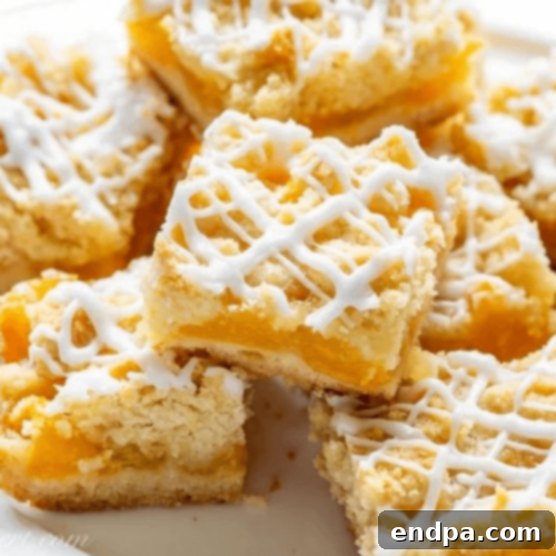 Peachy Keen: 51 Simple Dessert Ideas 27 Fresh Peach Crumb Bars topped with sweet almond icing