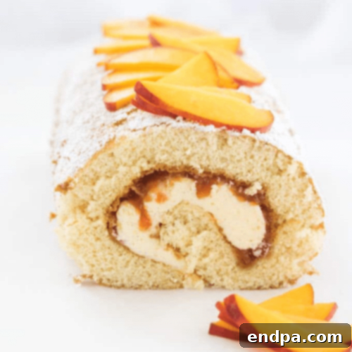 Peachy Keen: 51 Simple Dessert Ideas 35 Peaches and Cream Swiss Roll Cake with peach jam and creamy frosting