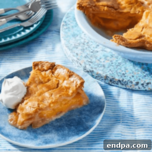 Peachy Keen: 51 Simple Dessert Ideas 43 Georgia Peach Pie with Bourbon Whipped Cream, showcasing juicy peak-season peaches