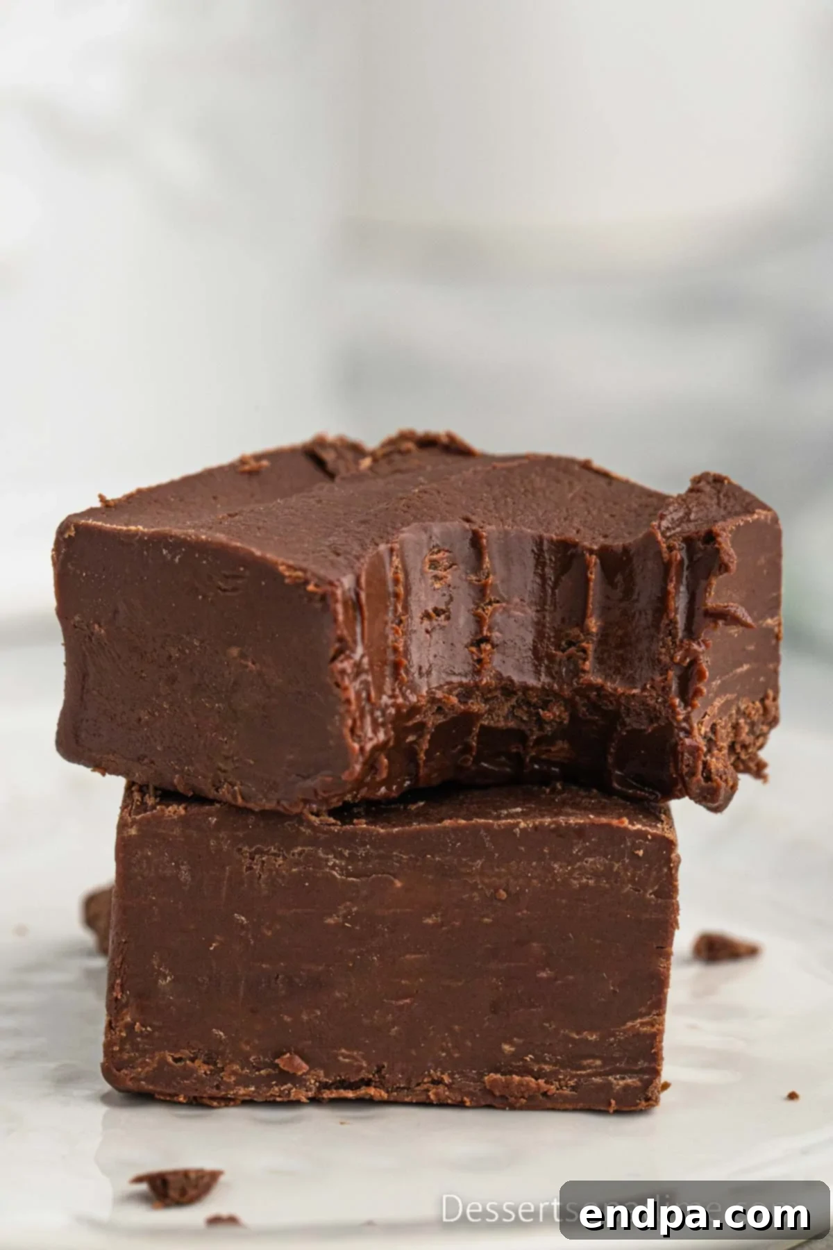 Crock Pot Fudge cut into neat squares, ready for serving.