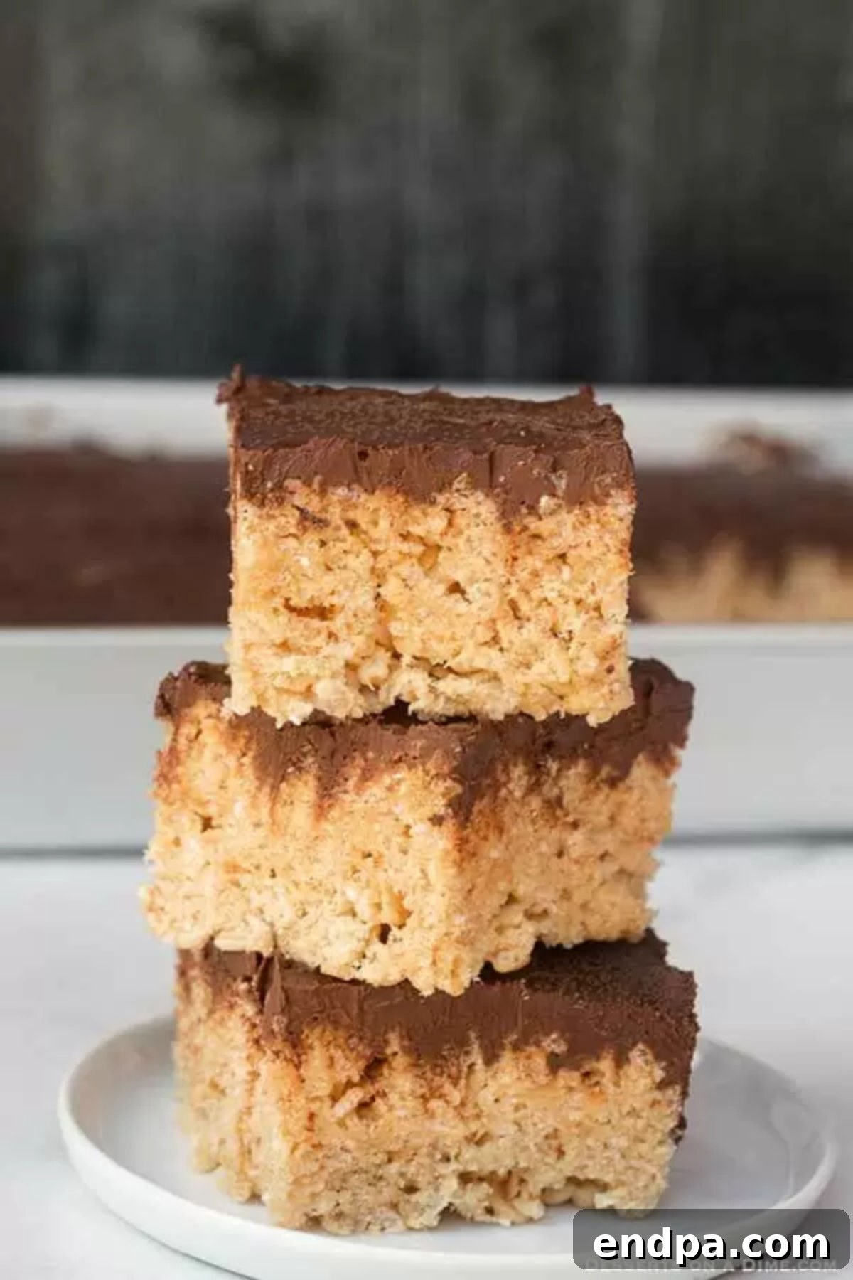 Chocolate Rice Krispie Treats stacked together.