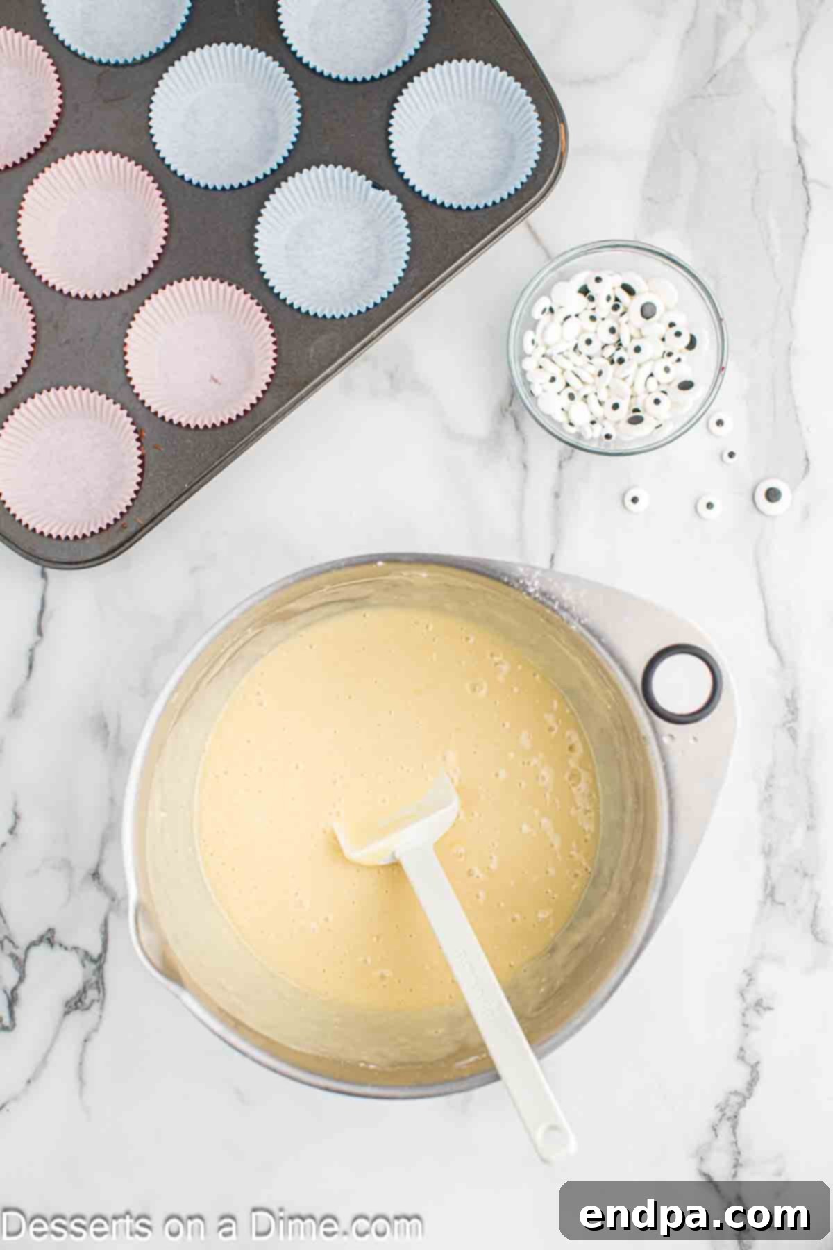 Spooktacular Monster Cupcakes 4 Mixing bowl with cake batter combined together.