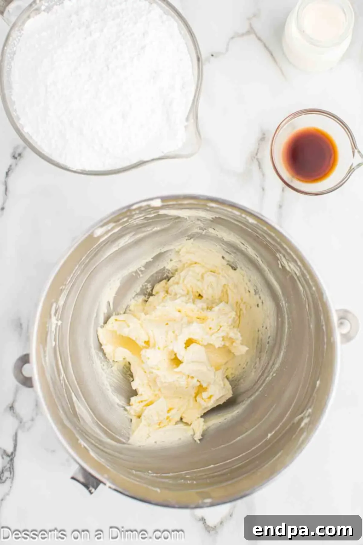 Spooktacular Monster Cupcakes 5 Mixing bowl with butter beaten until fluffy.