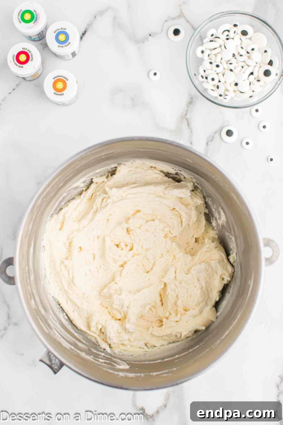 Spooktacular Monster Cupcakes 7 Heavy cream and vanilla extract mixed into the frosting mixture.