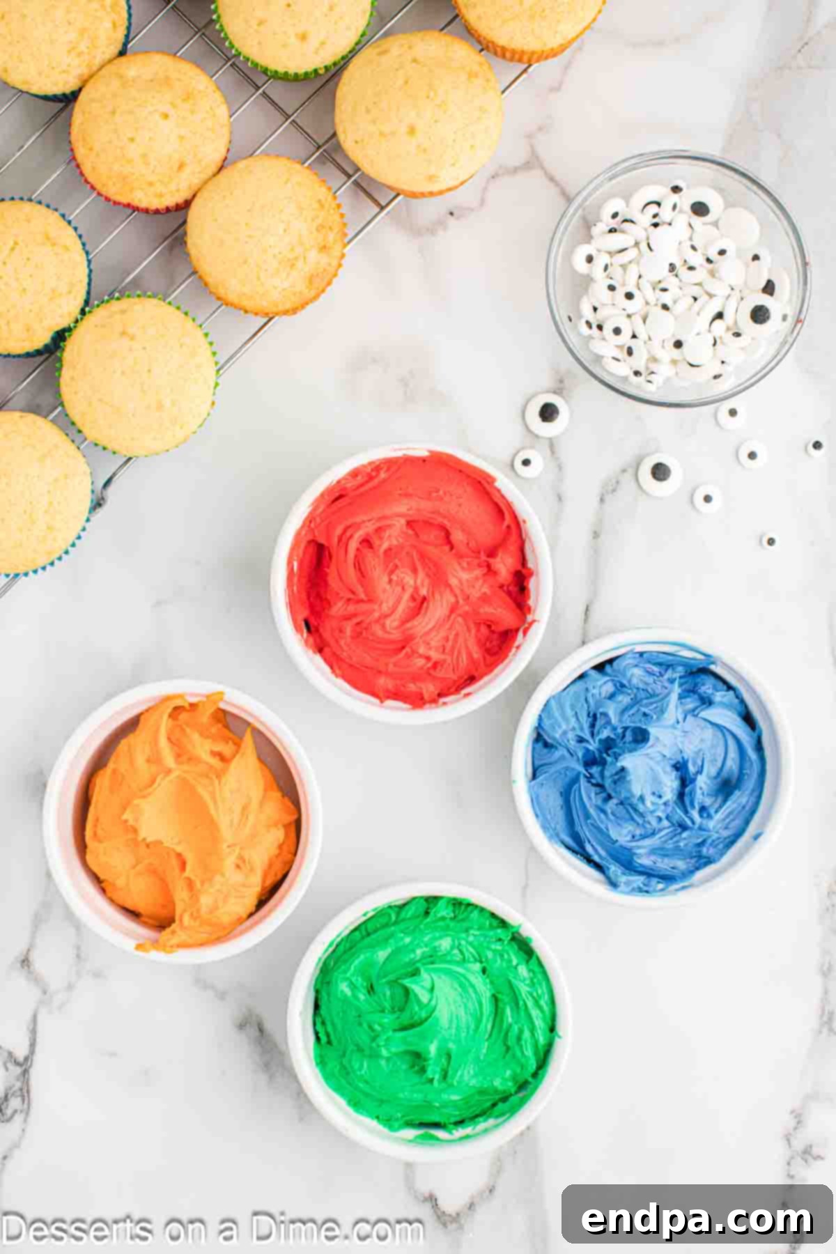 Spooktacular Monster Cupcakes 8 Bowls of frosting in different colors.