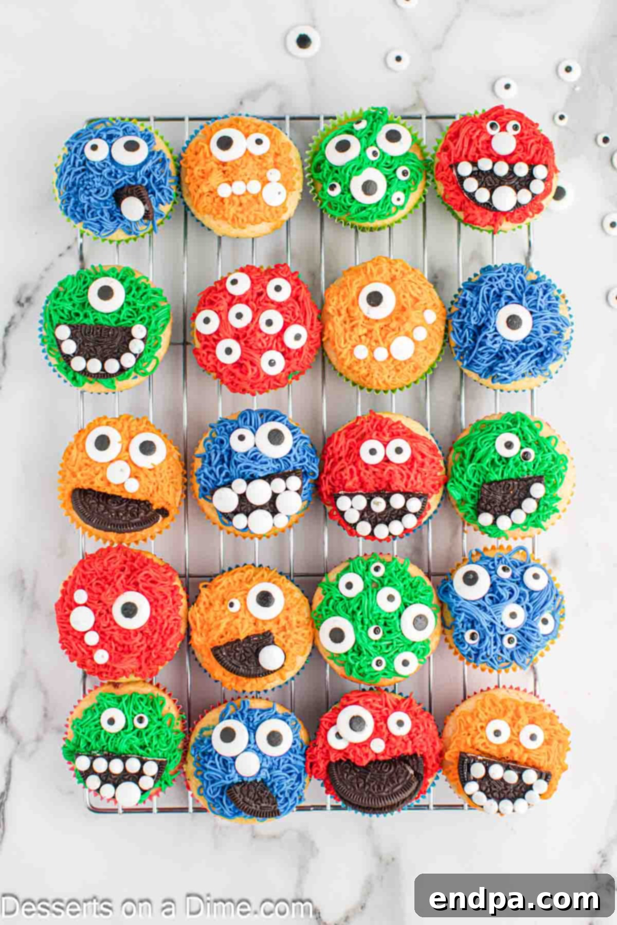 Spooktacular Monster Cupcakes 10 Cupcakes topped with candy eyes and cookies to make faces.