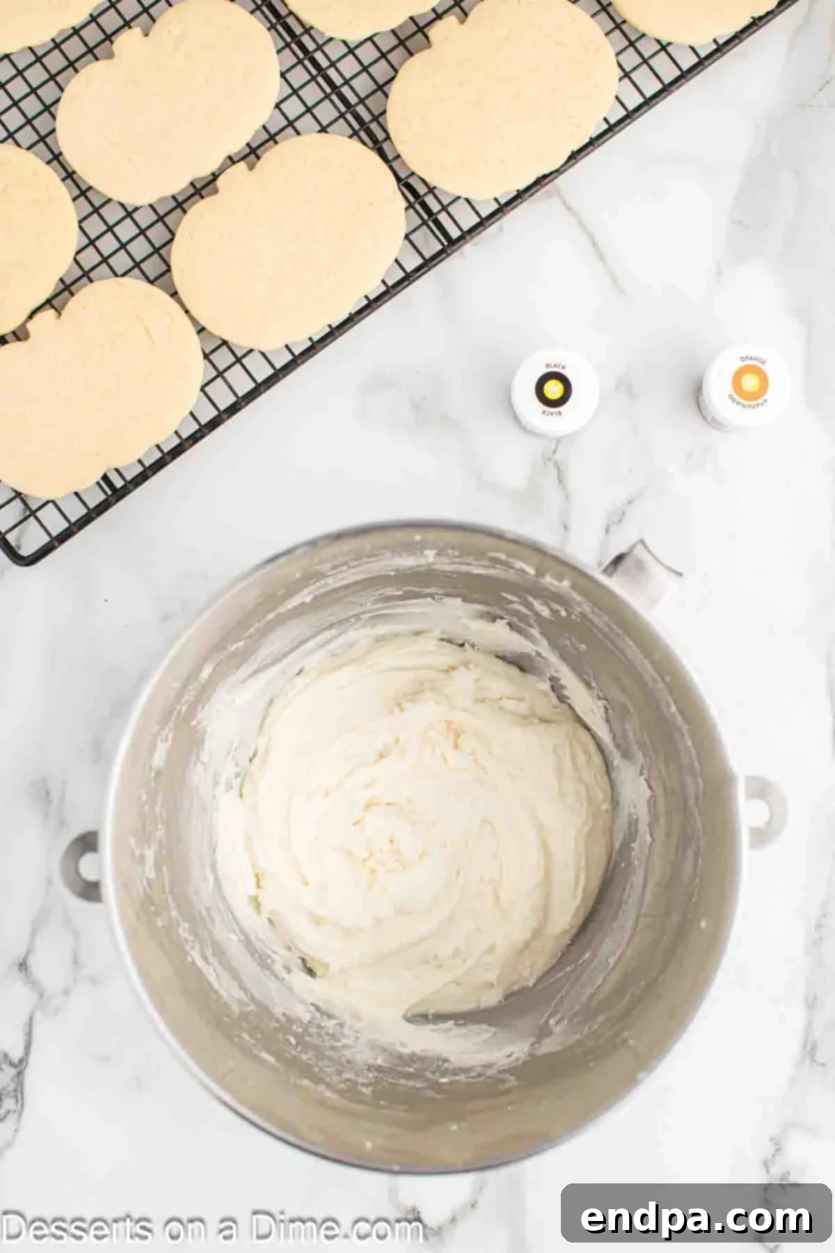 Frightfully Delicious Halloween Cookies 10 Frosting ingredients being mixed together in a bowl.