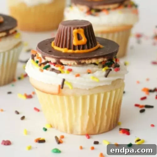 Charming Pilgrim Hat Thanksgiving Cupcakes with edible hats.