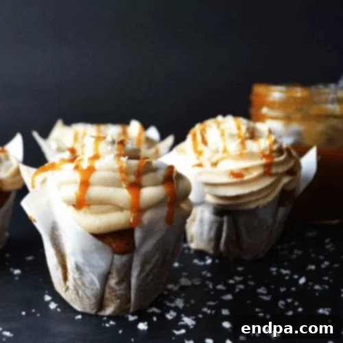Pumpkin cupcakes generously topped with luxurious salted caramel frosting.