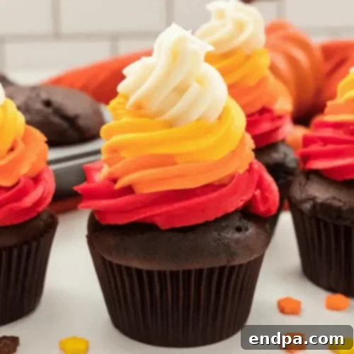 Beautifully decorated Harvest Thanksgiving Cupcakes with autumn colors.