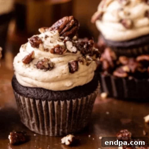 Luxurious Chocolate Bourbon Pecan Pie Cupcakes with butter pecan frosting.
