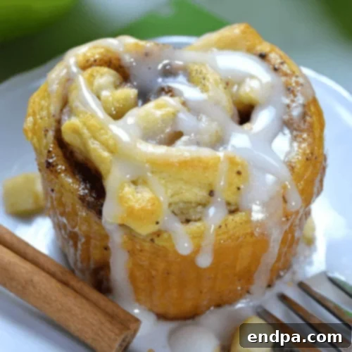 Delectable Apple Cinnamon Roll Cupcakes with maple glaze.
