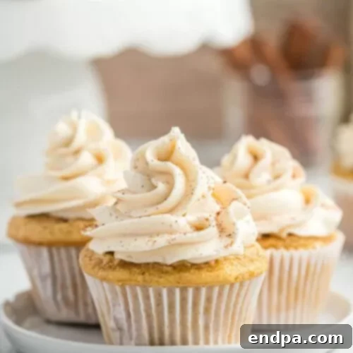 Festive Eggnog Cupcakes with a dusting of nutmeg.