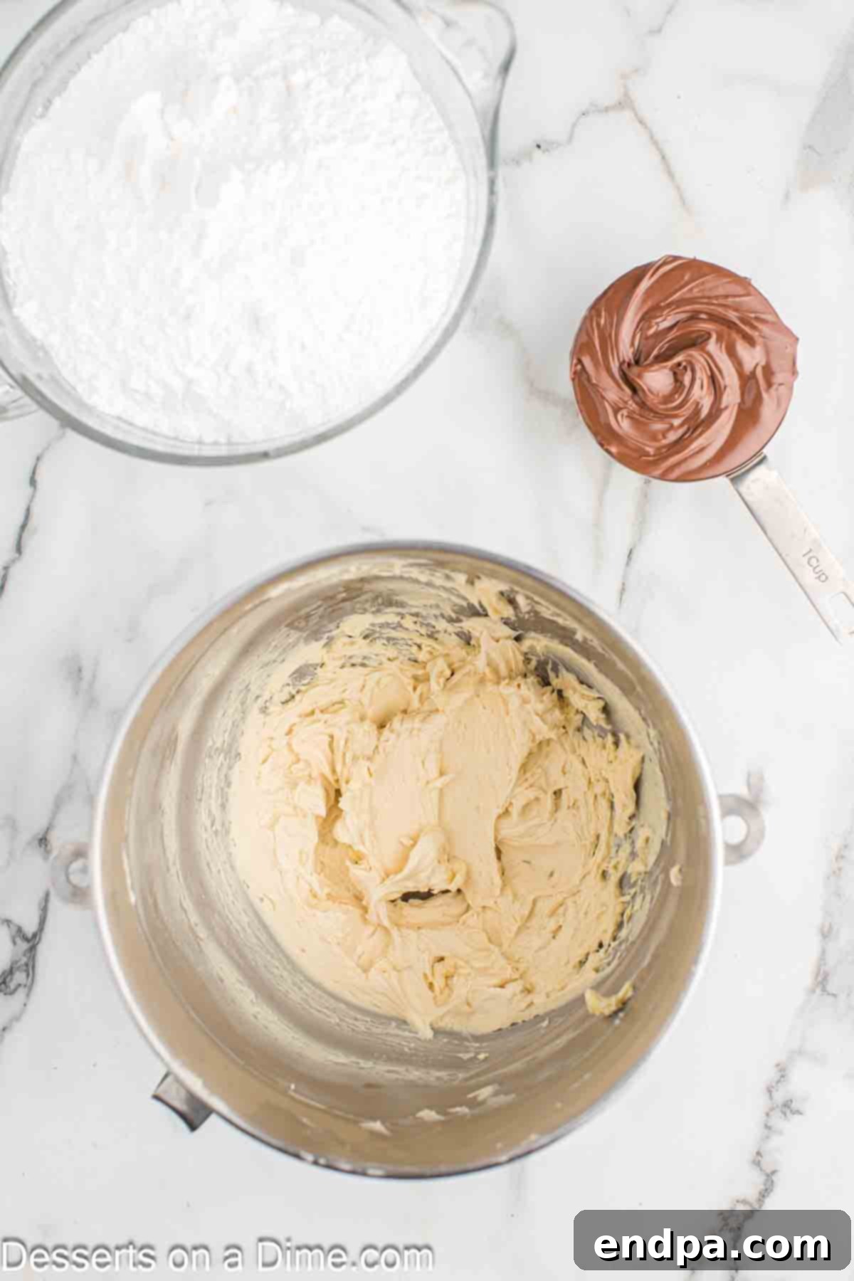 Butter and vanilla in mixing bowl.