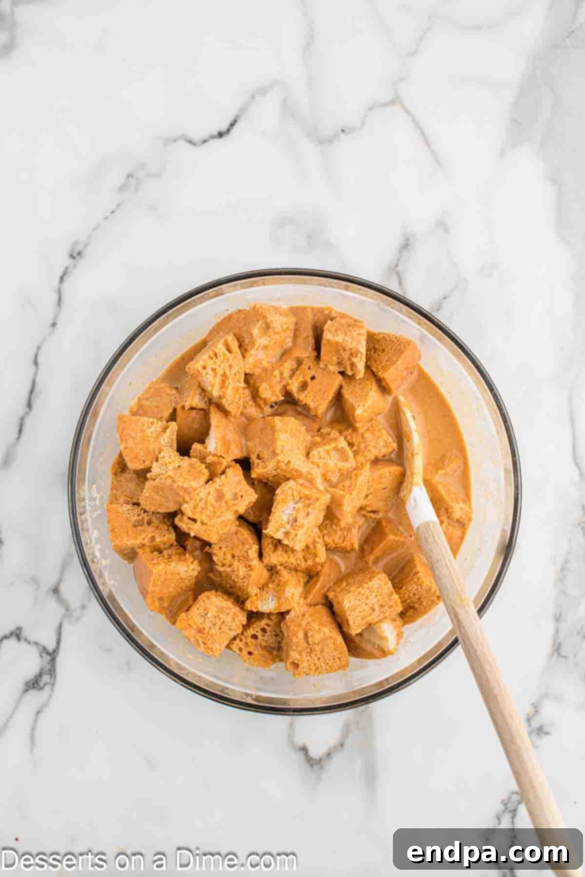 Mixture poured over the bread. 