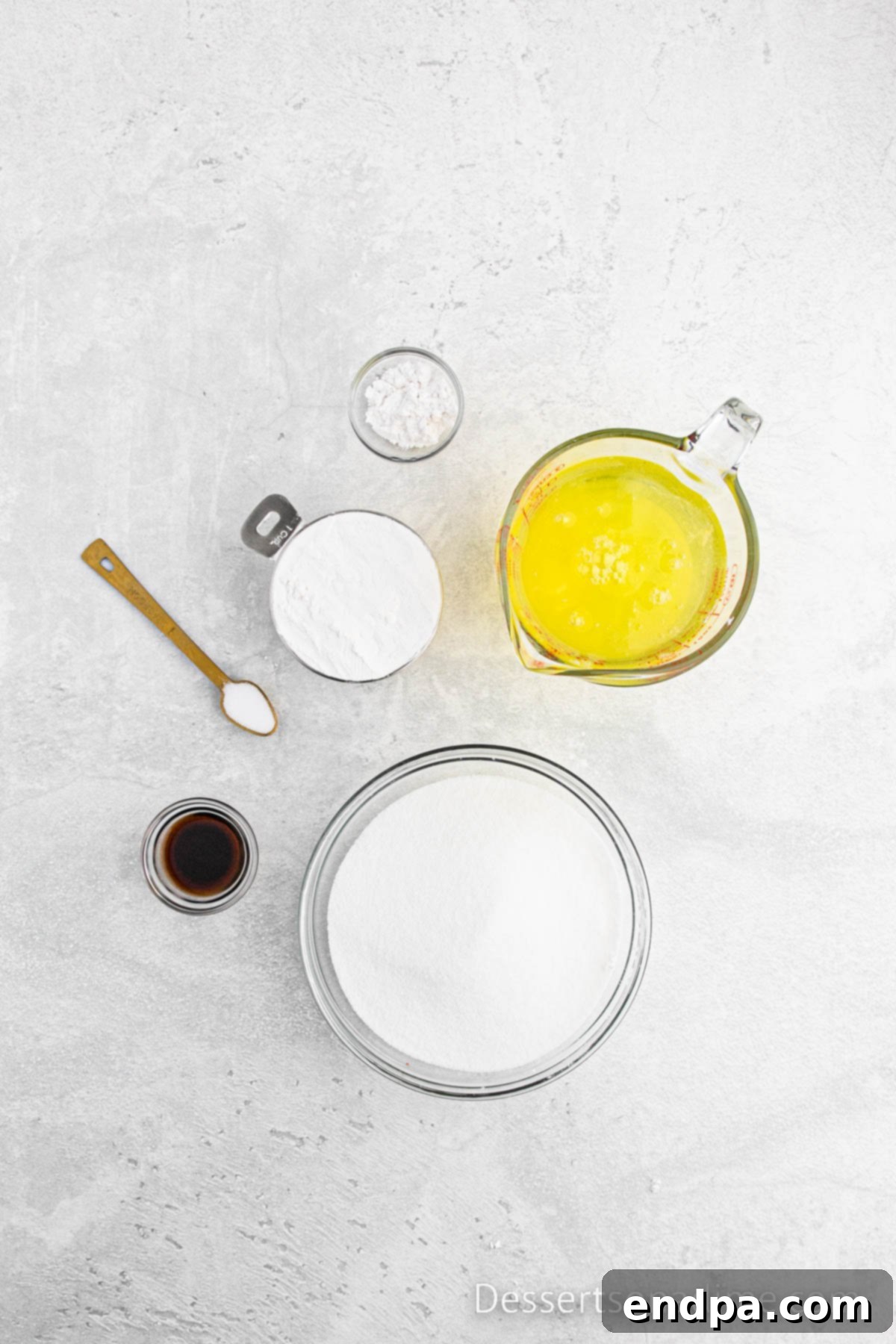 Ingredients for angel food cake: cake flour, granulated sugar, large egg whites, cream of tartar, vanilla extract, and salt.