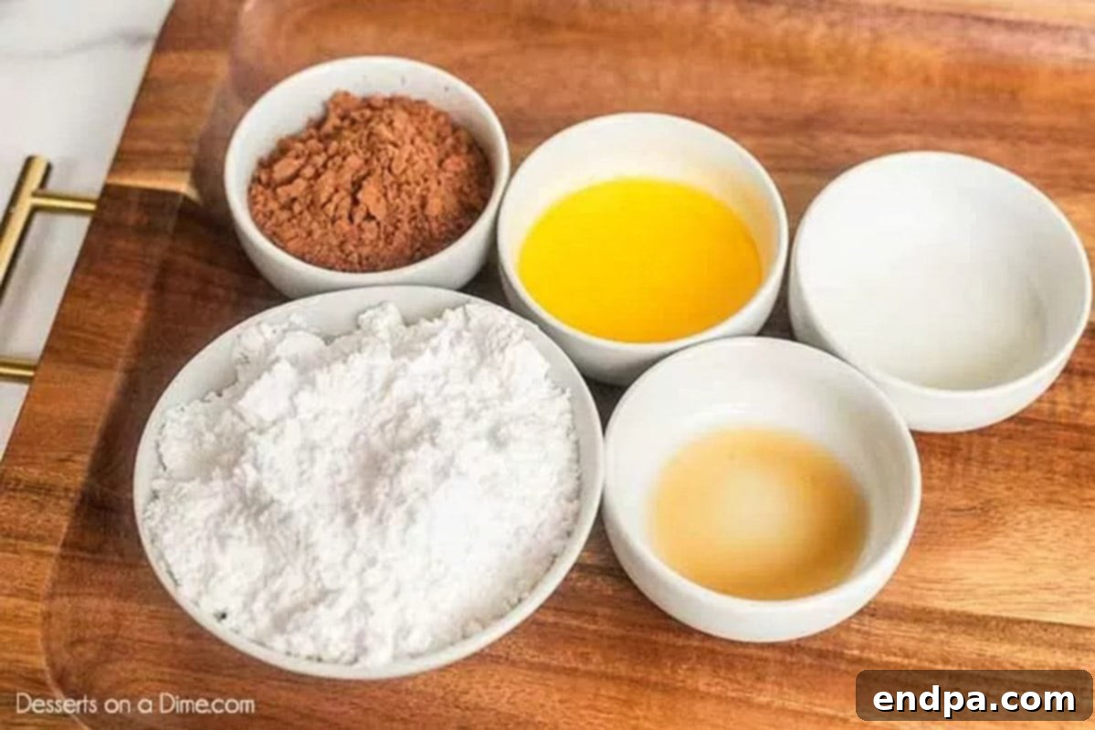 Frosting ingredients needed - butter, cocoa powder, powdered sugar, milk, vanilla extract