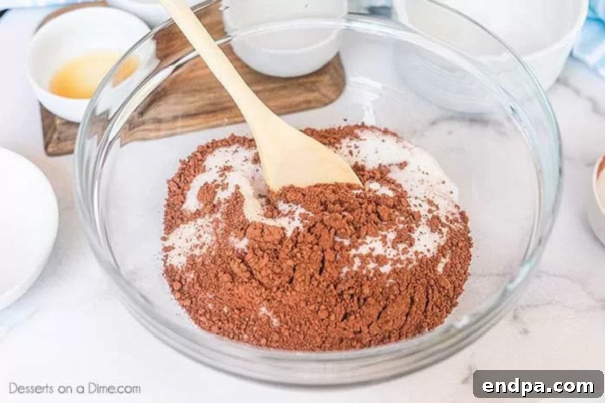 Combining the dry ingredients.