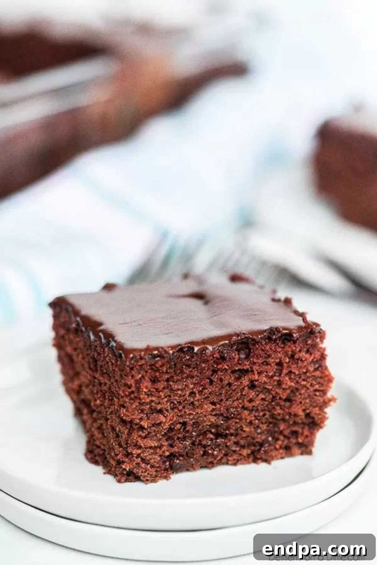 A slice of depression cake on a plate