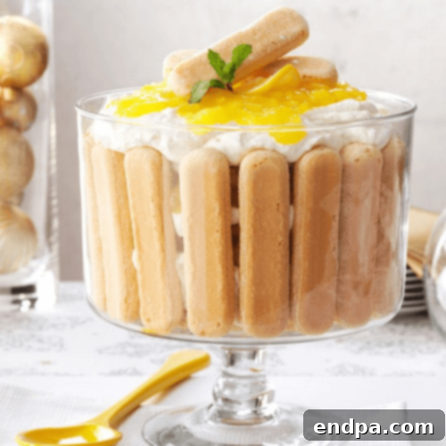 A beautiful Italian Pineapple Trifle, layered with creamy custard, cake, and pineapple chunks.