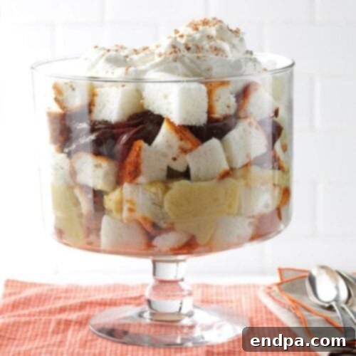 A decadent Chocolate Pineapple Trifle with layers of chocolate cake, fresh pineapple, and creamy whipped cream.