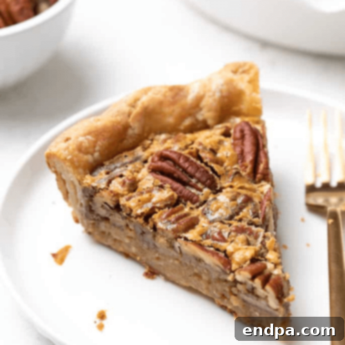 A perfectly baked Gluten Free Pecan Pie, rich and nutty.