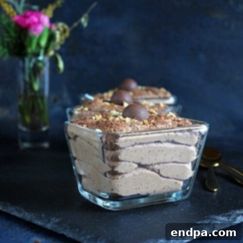 Rich and creamy Gluten Free Chocolate Mousse, garnished with chocolate shavings.