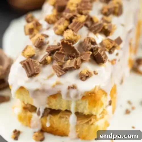 A slice of chocolate peanut butter cake on a plate.