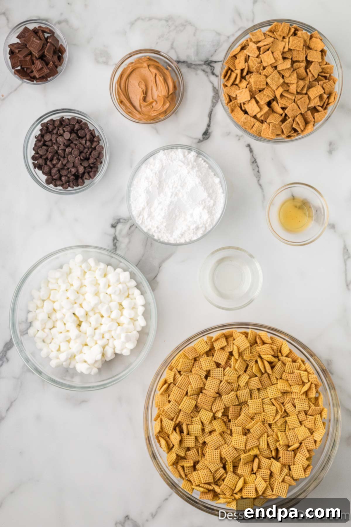 Smores Indulgence Mix 3 Key ingredients for S'mores Puppy Chow: Chex Cereal, creamy peanut butter, semi-sweet chocolate chips, vanilla extract, mini marshmallows, Golden Grahams cereal, and Hershey chocolate bars.