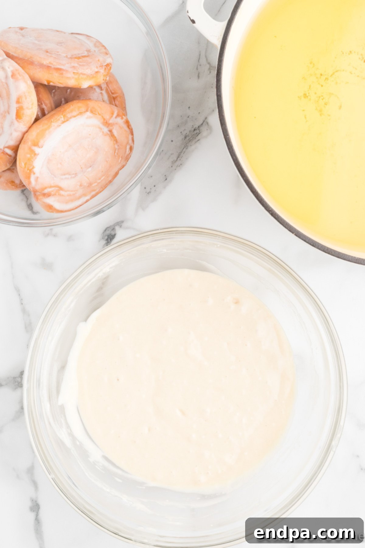Pancake batter ingredients fully combined in a mixing bowl.