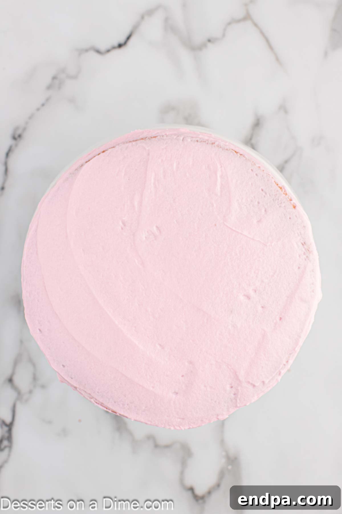 Cake frosted with icing.